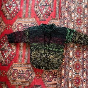 Colorful handknit wool toddler pullover.  Wool and Noro silk garden yarns.